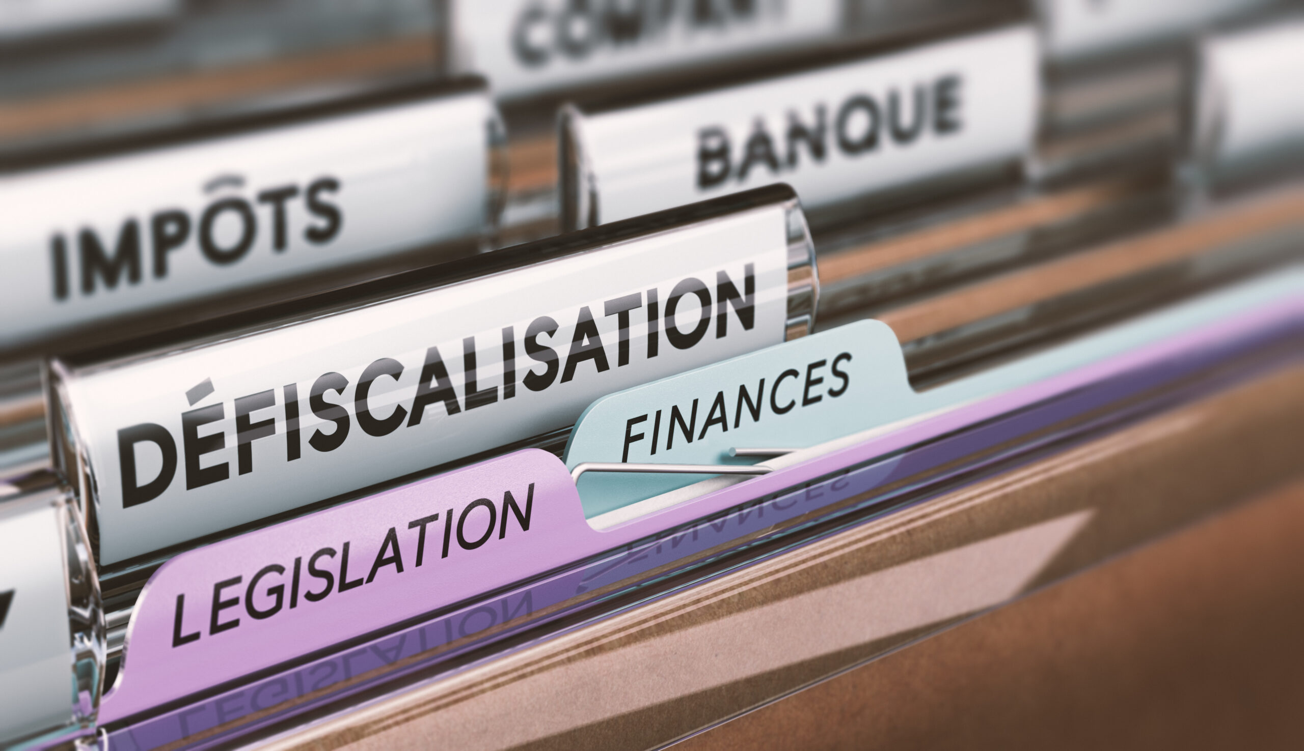Dossiers sur les impôts, les finances et la législation illustrant les dispositifs de défiscalisation.